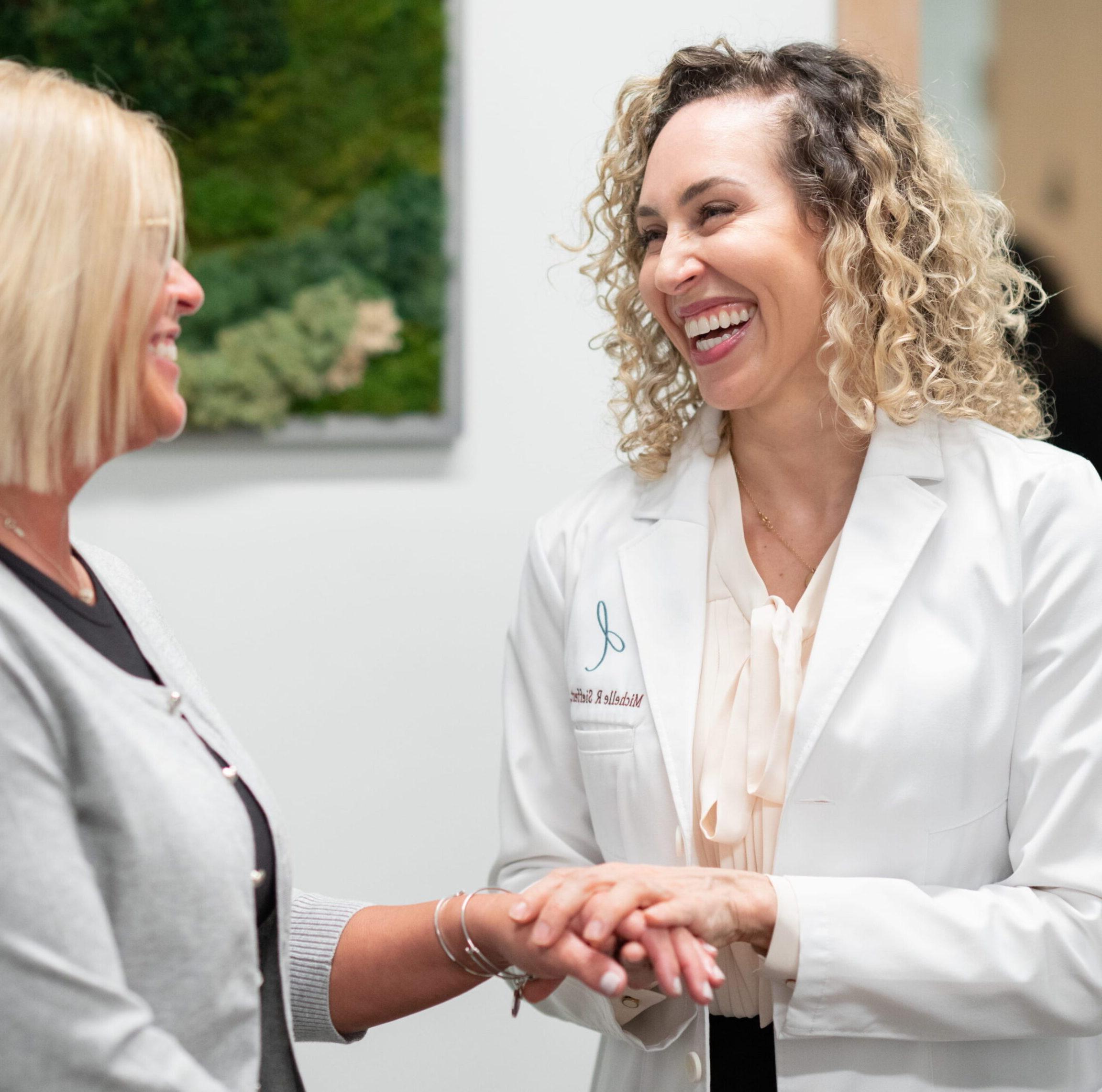 Dr. Sieffert talking to a patient in the office